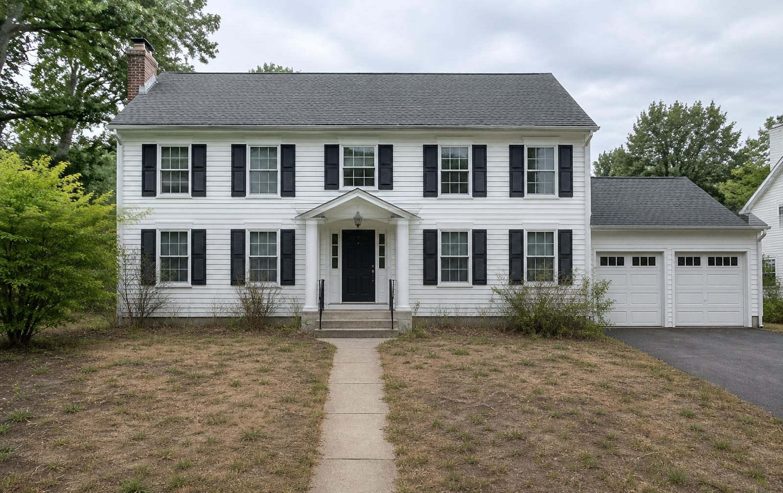 Before landscaping: colonial home front yard
